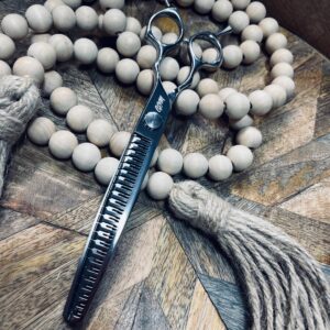 Thinning shears on wooden beads and tassel